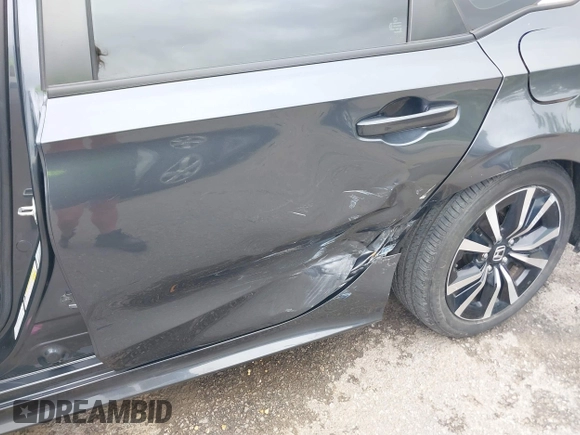 2023 Honda Civic EX with VIN 2HGFE1F73PH312228, listed as a IAAI auction lot 42185408 with 19,339 mi miles and . Bid and sale history available at DreamBid. Image 6.