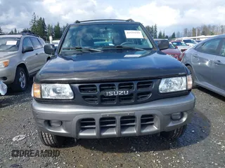 2001 Isuzu Rodeo z VIN 42CK58W9143610580, wystawiony jako IAAI lot #41939199 z przebiegiem 125 754 mil mil oraz . Historia ofert i sprzedaży dostępna na DreamBid. Obrazek 12.