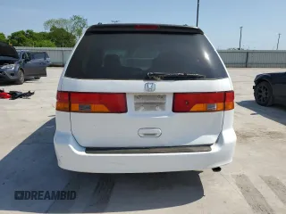 2004 Honda Odyssey EX-L with VIN 5FNRL18974B092979, listed as a Copart auction lot 52429055 with 106,515 mi miles and Clean Title. Bid and sale history available at DreamBid. Image 6.