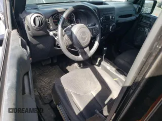 2018 Jeep Wrangler JK Unlimited Sport S with VIN 1C4BJWDG9JL812395, listed as a Copart auction lot 76397134 with 64,866 mi miles and Salvage Title. Bid and sale history available at carsss.com. Image 8.