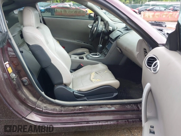 2003 Nissan 350Z Touring z VIN JN1AZ34E23T006079, wystawiony jako IAAI lot #42329365 z przebiegiem 188 290 mil mil oraz . Historia ofert i sprzedaży dostępna na DreamBid. Obrazek 5.