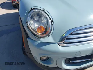 2013 MINI Hardtop with VIN WMWSU3C57DT690398, listed as a IAAI auction lot 41989221 with 112,954 mi miles and . Bid and sale history available at DreamBid. Image 20.