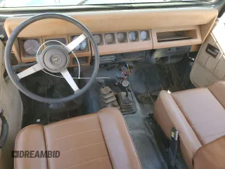 1994 Jeep Wrangler S with VIN 1J4FY19P7RP437520, listed as a Copart auction lot 57447085 with 124,023 mi miles and Salvage title. Bid and sale history available at DreamBid. Image 8.