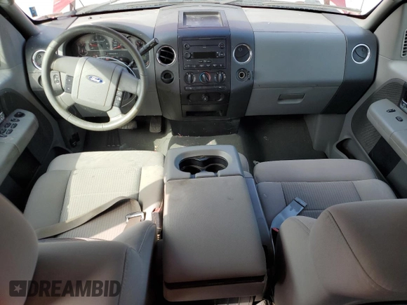 2007 Ford F-150 STX with VIN 1FTRX12W37FA60176, listed as a Copart auction lot 50972105 with 289,066 mi miles and Salvage Title. Bid and sale history available at DreamBid. Image 8.