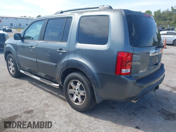 2011 Honda Pilot EX with VIN 5FNYF3H4XBB001140, listed as a IAAI auction lot 41940476 with 254,136 mi miles and . Bid and sale history available at carsss.com. Image 3.
