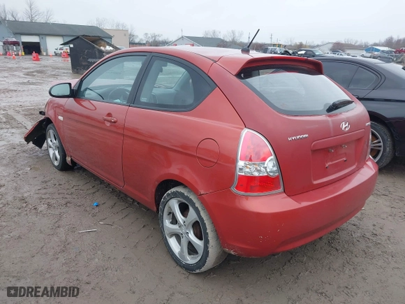 2008 Hyundai Accent SE with VIN KMHCN36C58U070319, listed as a IAAI auction lot 42010544 with 118,487 mi miles. Bid and sale history available at carsss.com. Image 3.