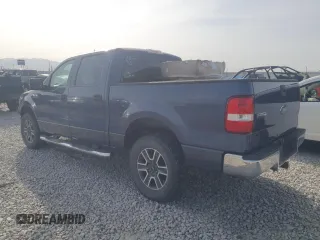 2005 Ford F-150 XLT with VIN 1FTPW14565FB11522, listed as a Copart auction lot 52006335 with 149,694 mi miles and Clean title. Bid and sale history available at DreamBid. Image 2.
