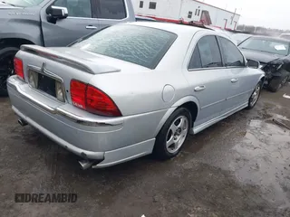 2002 Lincoln LS w/Base Pkg with VIN 1LNHM87A12Y607979, listed as a IAAI auction lot 41523445 with 174,826 mi miles. Bid and sale history available at carsss.com. Image 4.