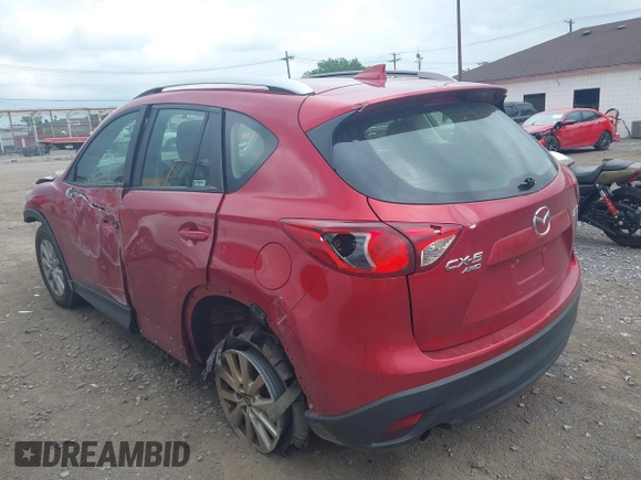 2016 Mazda CX-5 Sport with VIN JM3KE4BY3G0635882, listed as a IAAI auction lot 42545799 with 144,247 mi miles and . Bid and sale history available at DreamBid. Image 3.