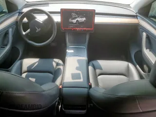 2024 Tesla Model Y Long Range с VIN 7SAYGDEE5RA261374, выставлен на аукционе Copart как лот 57666185 с пробегом 30 174 миль миль и Списание • Salvage title. История ставок и продаж доступна на DreamBid. Изображение 8.