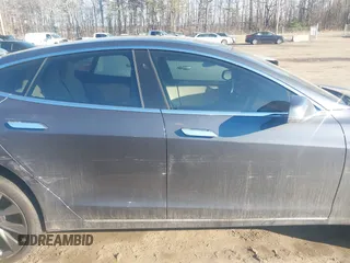 2019 Tesla Model S 75D with VIN 5YJSA1E2XKF331744, listed as a IAAI auction lot 41483173 with Not provided miles and . Bid and sale history available at DreamBid. Image 13.