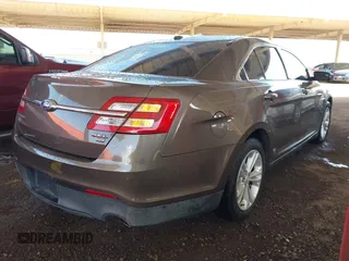 2015 Ford Taurus SEL with VIN 1FAHP2H87FG176103, listed as a IAAI auction lot 41950844 with 205,014 mi miles. Bid and sale history available at carsss.com. Image 4.
