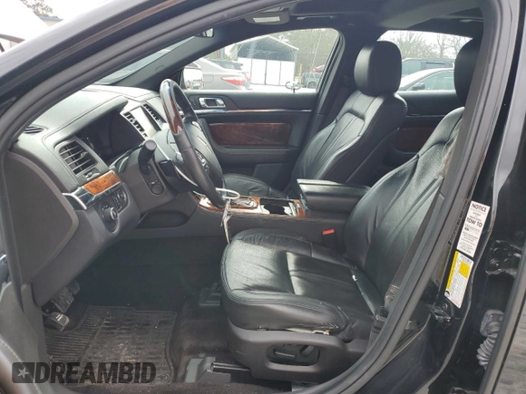 2015 Lincoln MKS z VIN 1LNHL9DK4FG603765, wystawiony jako Copart lot #47533935 z przebiegiem 75 284 mil mil oraz Szkoda całkowita • Salvage title. Historia ofert i sprzedaży dostępna na DreamBid. Obrazek 7.