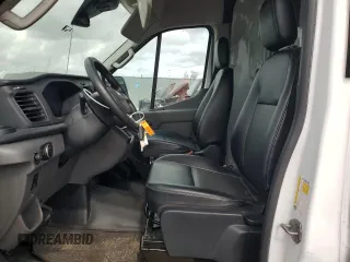 2023 Ford Transit Cargo z VIN 1FTYE1C89PKA17390, wystawiony jako Copart lot #83939214 z przebiegiem 76 099 mil mil oraz Szkoda całkowita • Salvage title. Historia ofert i sprzedaży dostępna na DreamBid. Obrazek 7.