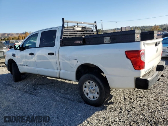 2017 Nissan Titan with VIN 1N6AA1F10HN501280, listed as a Copart auction lot 81840124 with 217,906 mi miles and Clean title. Bid and sale history available at DreamBid. Image 2.