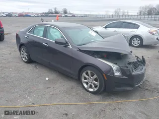 2014 Cadillac ATS Standard RWD with VIN 1G6AA5RX5E0179774, listed as a IAAI auction lot 41481032 with 85,189 mi miles. Bid and sale history available at carsss.com. Image 1.