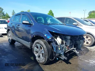 2018 Honda CR-V LX z VIN 2HKRW6H36JH211361, wystawiony jako IAAI lot #42045110 z przebiegiem 147 980 mil mil oraz . Historia ofert i sprzedaży dostępna na DreamBid. Obrazek 1.