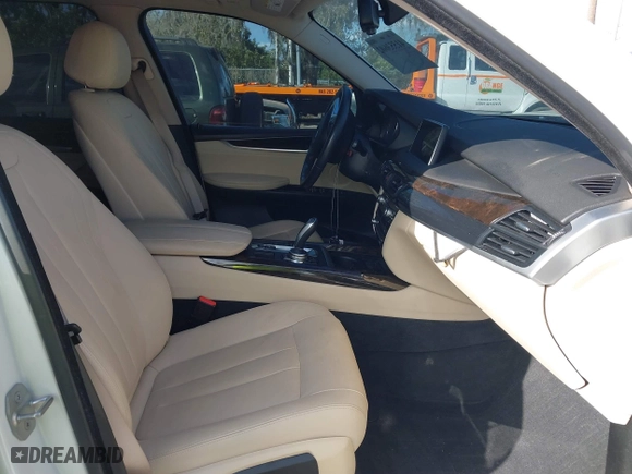 2016 BMW X5 xDrive35i with VIN 5UXKR0C54G0P27141, listed as a IAAI auction lot 41553602 with 61,947 mi miles. Bid and sale history available at carsss.com. Image 5.
