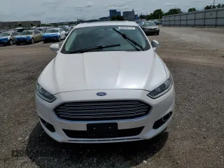 2016 Ford Fusion SE with VIN 3FA6P0HD3GR141447, listed as a Copart auction lot 63878715 with 211,262 mi miles and Clean title. Bid and sale history available at DreamBid. Image 5.