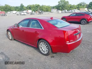 2011 Cadillac CTS Luxury with VIN 1G6DE5EY1B0171215, listed as a IAAI auction lot 42802832 with 179,143 mi miles and . Bid and sale history available at DreamBid. Image 3.