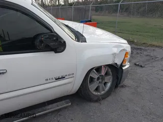 2012 Chevrolet Silverado 1500 LT with VIN 3GCPCSE07CG115883, listed as a IAAI auction lot 41722178 with 217,797 mi miles. Bid and sale history available at carsss.com. Image 17.
