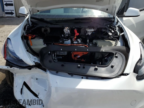 2025 Tesla Model Y Long Range with VIN 7SAYGDED4SF232433, listed as a Copart auction lot 51504015 with Not Provided miles and Salvage Title. Bid and sale history available at DreamBid. Image 12.