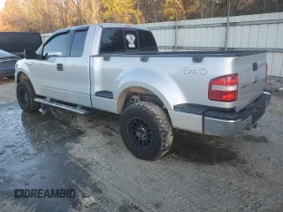 2006 Ford F-150 XLT with VIN 1FTPX04596KB93701, listed as a Copart auction lot 87672425 with 102,128 mi miles and Salvage title. Bid and sale history available at DreamBid. Image 2.