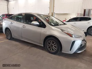 2020 Toyota Prius L Eco with VIN JTDKARFU9L3104185, listed as a IAAI auction lot 41278803 with 108,686 mi miles. Bid and sale history available at carsss.com. Image 1.
