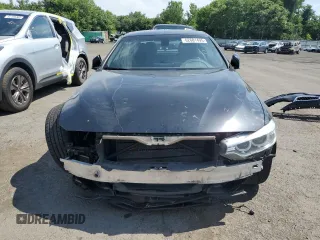 2015 BMW 4 Series 428i xDrive z VIN WBA3T1C57FP820896, wystawiony jako Copart lot #62681495 z przebiegiem 147 357 mil mil oraz Szkoda całkowita • Salvage title. Historia ofert i sprzedaży dostępna na DreamBid. Obrazek 5.