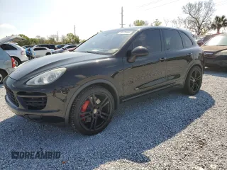 2012 Porsche Cayenne Turbo z VIN WP1AC2A23CLA81326, wystawiony jako Copart lot #49175495 z przebiegiem 139 656 mil mil oraz Czysty tytuł • Clean title. Historia ofert i sprzedaży dostępna na DreamBid. Obrazek 1.