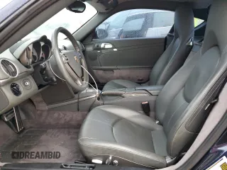 2006 Porsche Cayman S с VIN WP0AB29836U781164, выставлен на аукционе Copart как лот 74904904 с пробегом 130 705 миль миль и Списание • Salvage title. История ставок и продаж доступна на DreamBid. Изображение 7.
