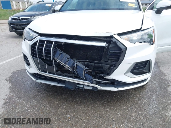 2021 Audi Q3 Premium with VIN WA1AUCF33M1096437, listed as a IAAI auction lot 41910411 with 86,837 mi miles and . Bid and sale history available at DreamBid. Image 6.