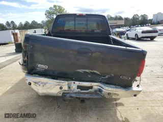 2002 Ford Super Duty F-250 XL with VIN 1FTNW21F92EA03004, listed as a Copart auction lot 49316115 with 209,520 mi miles and Salvage Title. Bid and sale history available at carsss.com. Image 6.