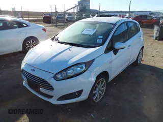 2019 Ford Fiesta SE z VIN 3FADP4EJ0KM148306, wystawiony jako IAAI lot #41666170 z przebiegiem 68 966 mil mil oraz . Historia ofert i sprzedaży dostępna na DreamBid. Obrazek 2.