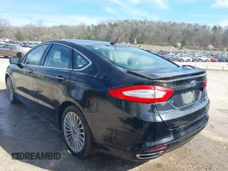2016 Ford Fusion Titanium with VIN 3FA6P0K92GR284491, listed as a IAAI auction lot 41824323 with 148,016 mi miles. Bid and sale history available at carsss.com. Image 3.