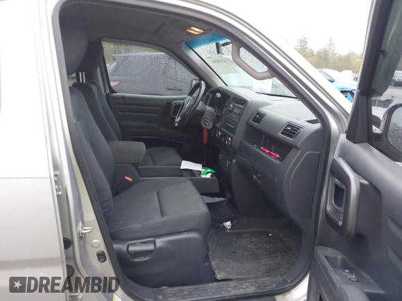 2012 Honda Ridgeline Sport z VIN 5FPYK1F77CB459174, wystawiony jako IAAI lot #42158366 z przebiegiem 131 988 mil mil oraz . Historia ofert i sprzedaży dostępna na DreamBid. Obrazek 5.