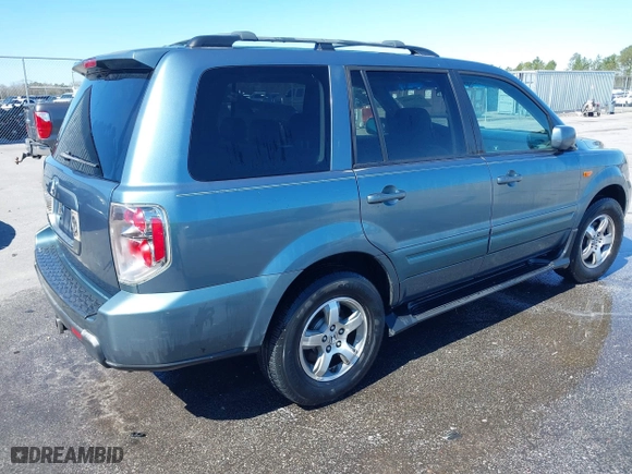 2006 Honda Pilot EX-L with VIN 5FNYF28586B004479, listed as a IAAI auction lot 41759406 with 301,087 mi miles. Bid and sale history available at carsss.com. Image 4.