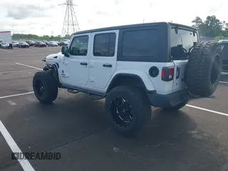 2020 Jeep Wrangler Unlimited Sport S with VIN 1C4HJXDN6LW198065, listed as a IAAI auction lot 42049279 with 72,512 mi miles. Bid and sale history available at carsss.com. Image 3.