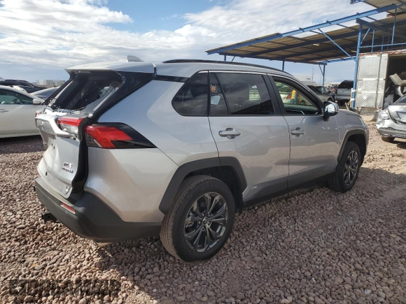 2024 Toyota RAV4 Hybrid XLE Premium with VIN JTMB6RFV7RJ044969, listed as a Copart auction lot 48365255 with 16,176 mi miles and Salvage title. Bid and sale history available at DreamBid. Image 3.