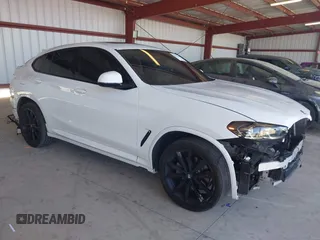2024 BMW X4 xDrive30i with VIN 5UX33DT00R9U63349, listed as a IAAI auction lot 42322299 with 23,526 mi miles and . Bid and sale history available at DreamBid. Image 1.