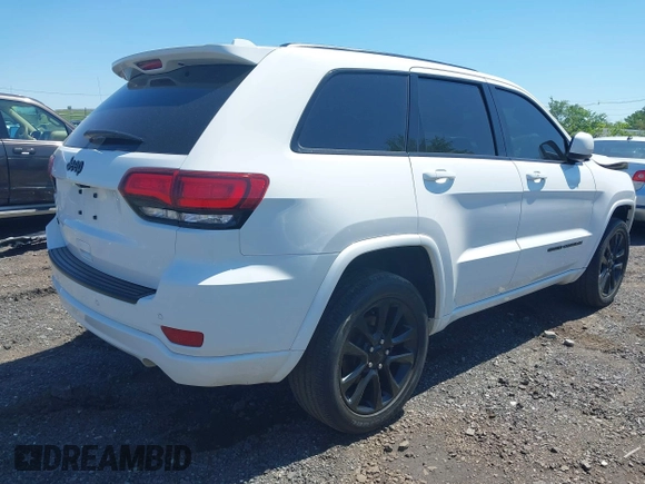2021 Jeep Grand Cherokee Laredo X with VIN 1C4RJFAG6MC759825, listed as a IAAI auction lot 42281301 with 47,417 mi miles and . Bid and sale history available at DreamBid. Image 4.