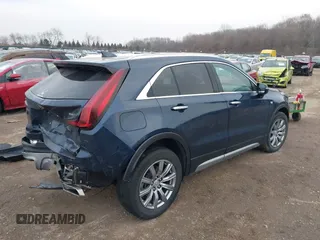 2021 Cadillac XT4 FWD Premium Luxury with VIN 1GYFZCR41MF041306, listed as a IAAI auction lot 41143747 with 53,116 mi miles. Bid and sale history available at carsss.com. Image 4.