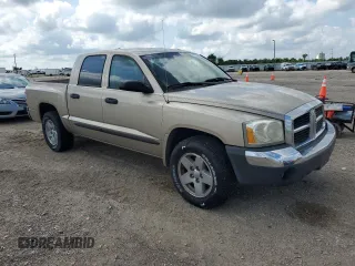 2005 Dodge Dakota SLT with VIN 1D7HE48N65S215055, listed as a Copart auction lot 56193435 with 140,705 mi miles and Clean Title. Bid and sale history available at DreamBid. Image 4.