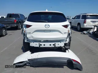 2018 Mazda CX-5 Touring with VIN JM3KFACM0J0416716, listed as a IAAI auction lot 42150121 with 61,332 mi miles and . Bid and sale history available at carsss.com. Image 17.