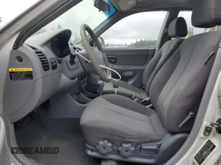2005 Hyundai Accent GLS z VIN KMHCG45C75U639281, wystawiony jako Copart lot #54887095 z przebiegiem 136 090 mil mil oraz Szkoda całkowita • Salvage title. Historia ofert i sprzedaży dostępna na DreamBid. Obrazek 7.