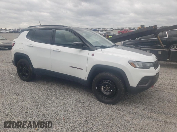 2023 Jeep Compass Trailhawk with VIN 3C4NJDDN5PT565793, listed as a Copart auction lot 50060115 with 38,292 mi miles and Salvage title. Bid and sale history available at DreamBid. Image 4.