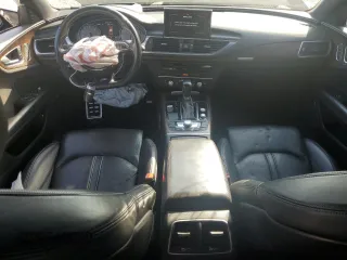 2016 Audi S7 with VIN WAUW2BFCXGN050058, listed as a Copart auction lot 73371514 with 65,771 mi miles and Salvage Title. Bid and sale history available at carsss.com. Image 8.