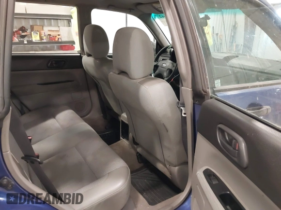 2003 Subaru Forester X with VIN JF1SG63663H708501, listed as a IAAI auction lot 41547662 with 208,134 mi miles. Bid and sale history available at carsss.com. Image 8.