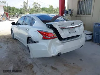 2015 Nissan Altima 2.5 SL with VIN 1N4AL3AP0FN339562, listed as a IAAI auction lot 41876685 with 127,493 mi miles. Bid and sale history available at carsss.com. Image 3.
