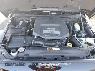 2014 Jeep Wrangler Sahara with VIN 1C4AJWBG9EL102983, listed as a Copart auction lot 84501554 with 120,372 mi miles and Salvage Title. Bid and sale history available at DreamBid. Image 12.